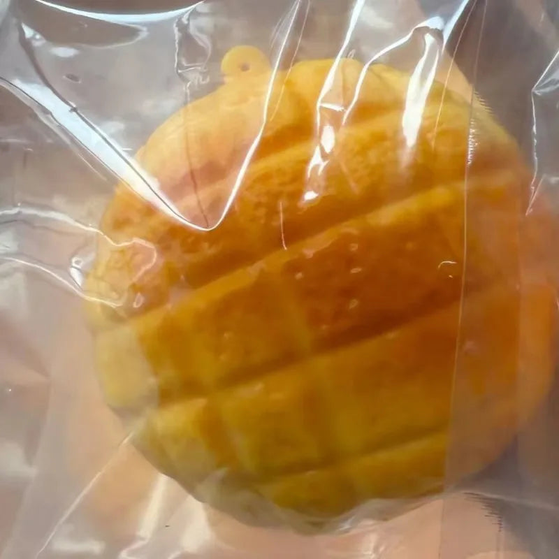 Pink Pineapple Bun Squishy Toy